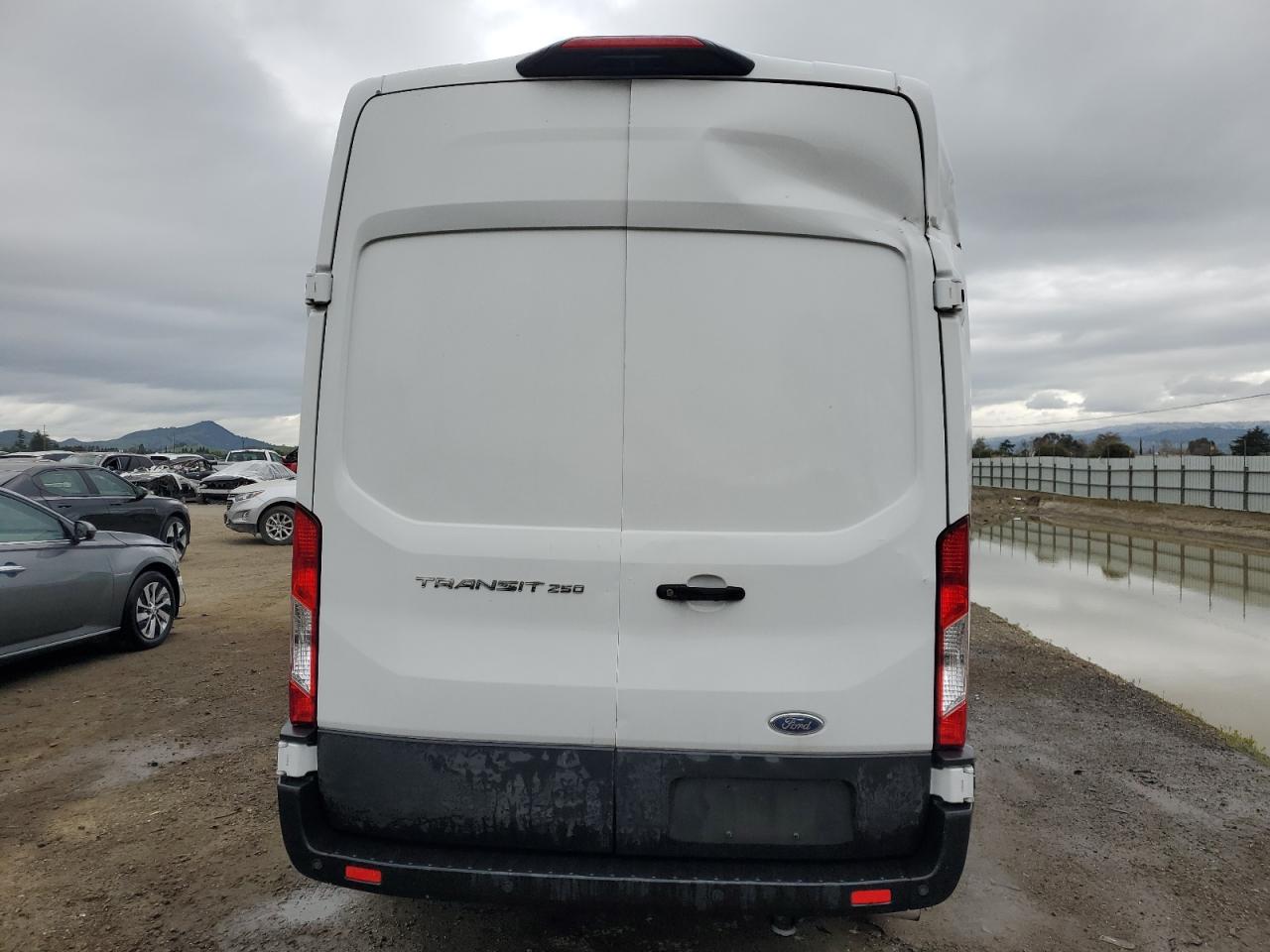 2023 Ford Transit VIN 1FTBR1X8XPKB17633 Copart auction photo, all over damage thumbnail 6