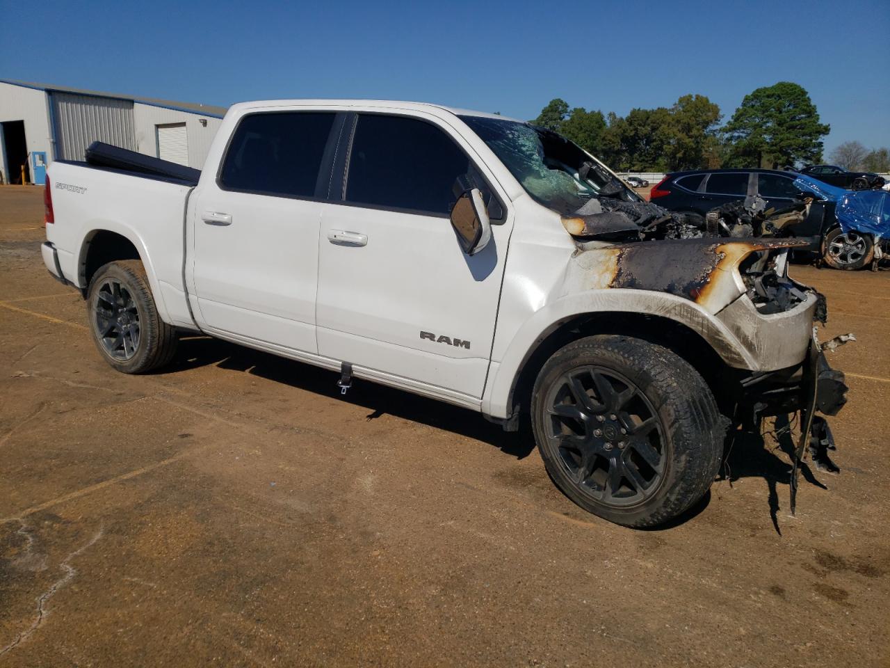2022 RAM 1500 VIN 1C6SRFJT7NN450398 Copart auction photo, burn damage thumbnail 4