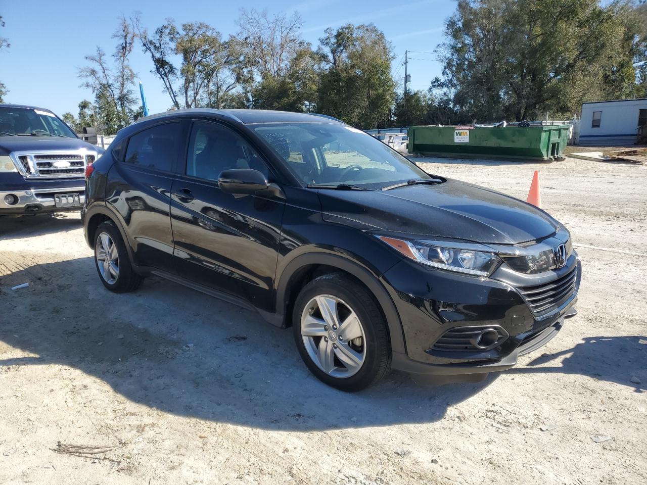 2019 Honda HR-V VIN 3CZRU5H58KM717958 Copart auction photo, rear end / side damage thumbnail 4