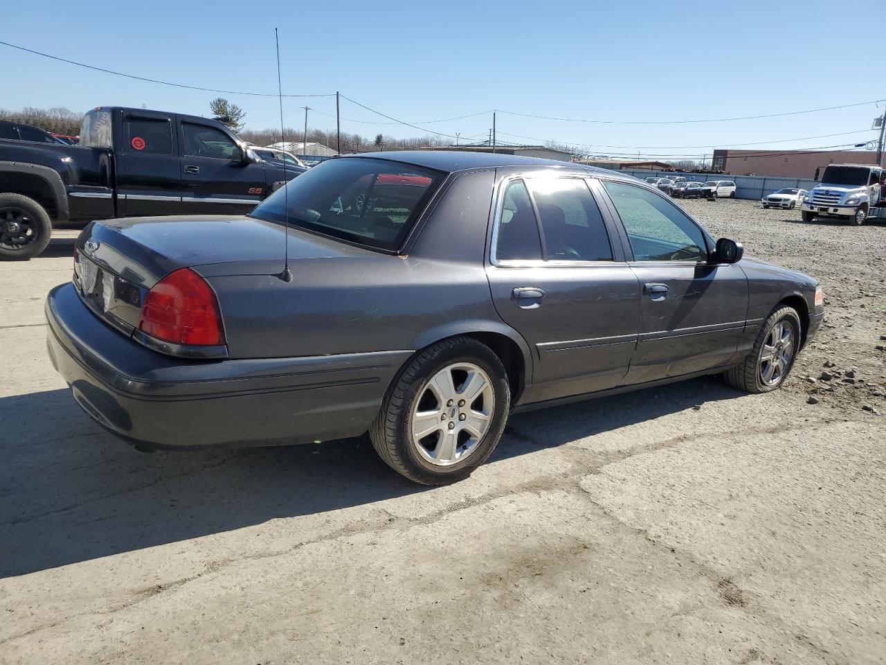 2005 Ford Crown Victoria VIN 2FAHP74WX5X110509 Copart auction photo, side / front end damage thumbnail 3