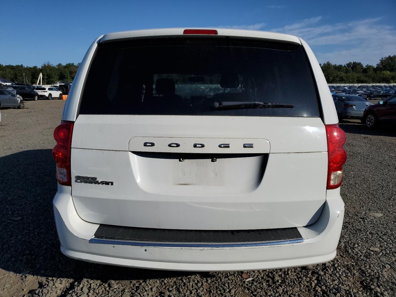 2016 Dodge Caravan VIN 2C4RDGBG5GR117362 Copart auction photo, water/flood damage thumbnail 6