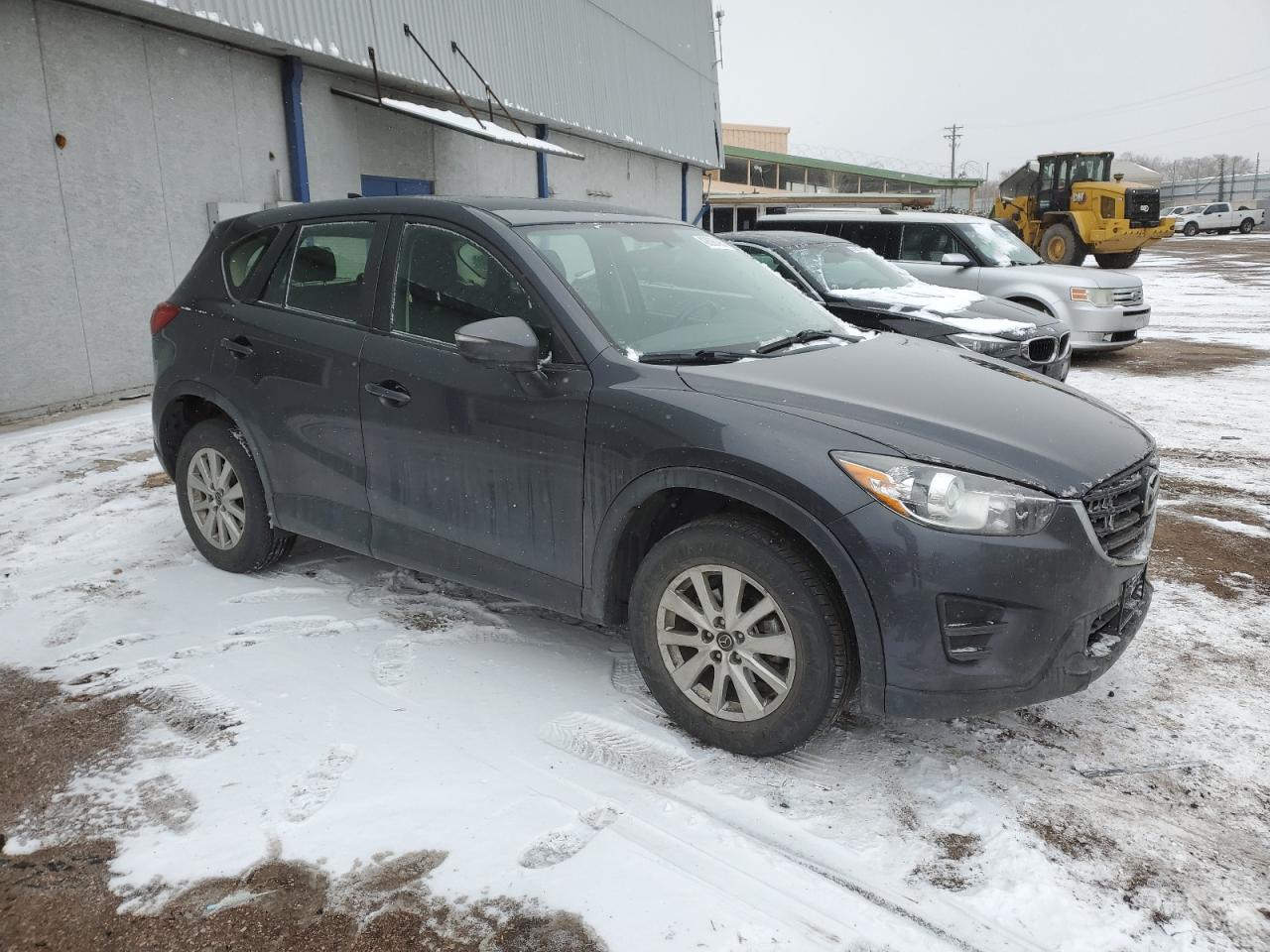 2016 Mazda CX-5 VIN JM3KE4BY2G0861993 Copart auction photo, hail damage thumbnail 4