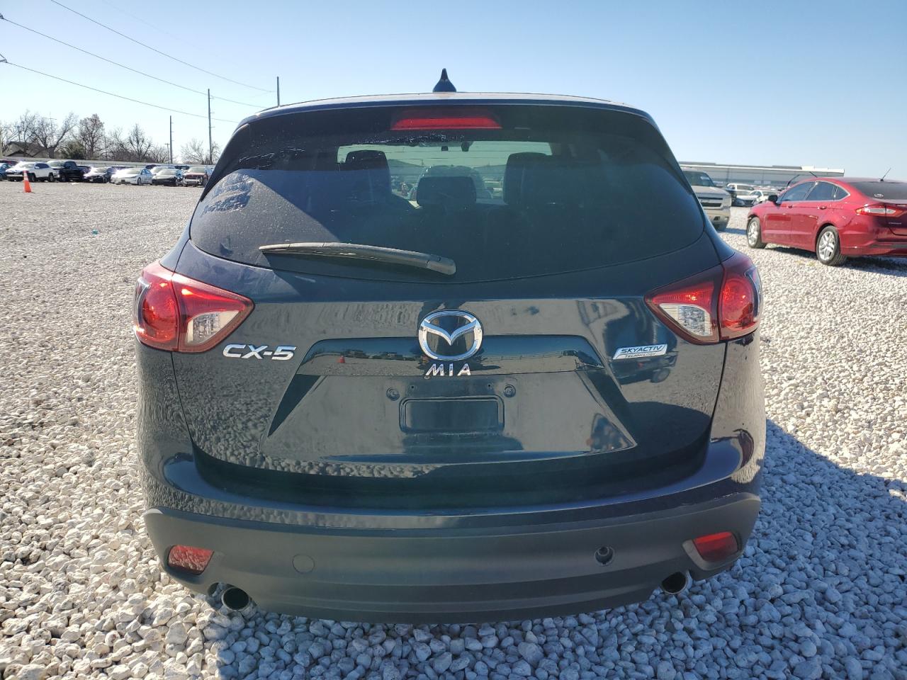 2016 Mazda CX-5 VIN JM3KE2DY0G0669182 Copart auction photo, side / front end damage thumbnail 6