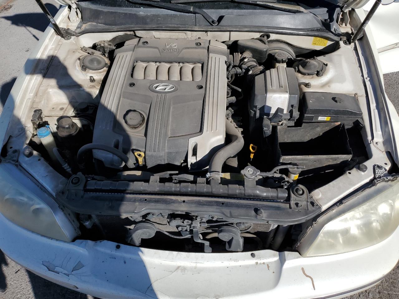 2005 Hyundai Grandeur VIN KMHFU45E45A408539 Copart auction photo, side / front end damage thumbnail 12