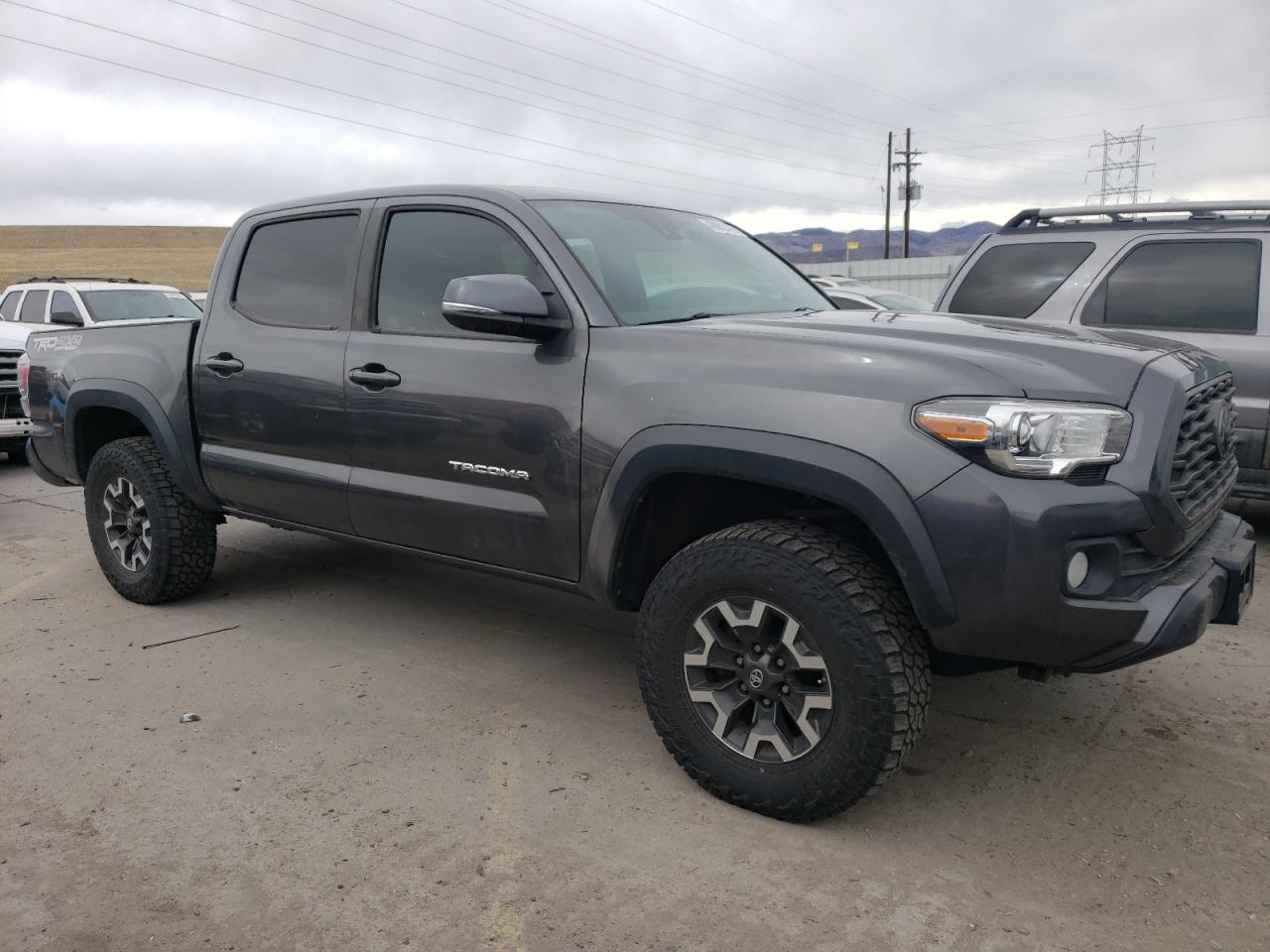 2020 Toyota Tacoma VIN 3TMCZ5AN2LM314700 Copart auction photo, rear end / minor dent/scratches damage thumbnail 4