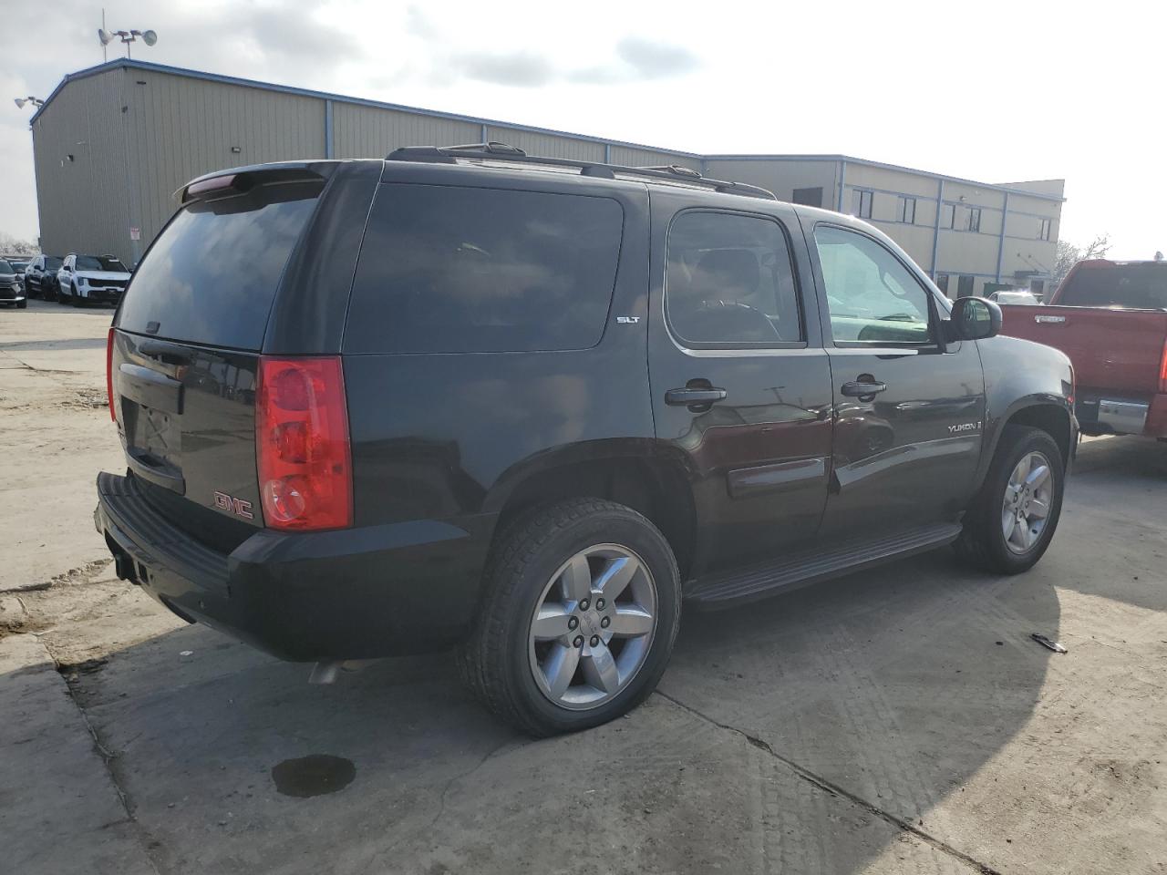 2009 GMC Yukon VIN 1GKFC33099J117831 Copart auction photo, side / rear end damage thumbnail 3