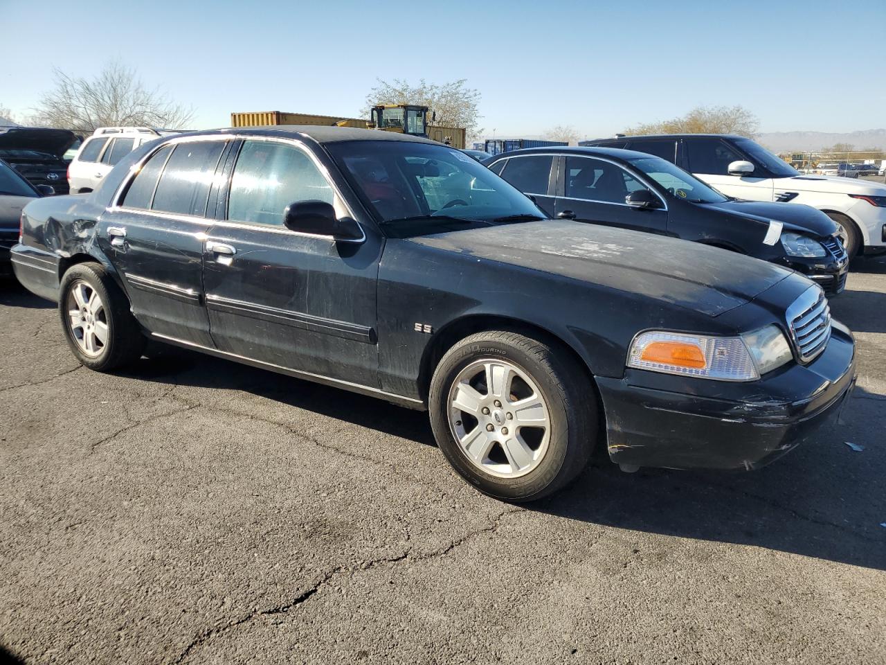 2011 Ford Crown Victoria VIN 2FABP7EVXBX165596 Copart auction photo, rear end damage thumbnail 4