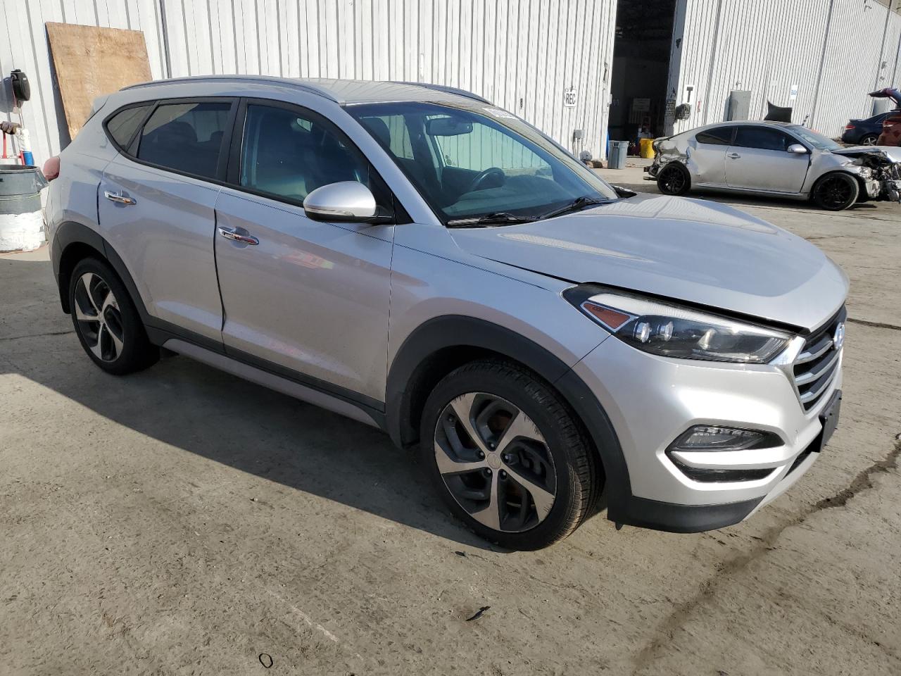 2018 Hyundai Tucson VIN KM8J3CA28JU812357 Copart auction photo, front end / side damage thumbnail 4
