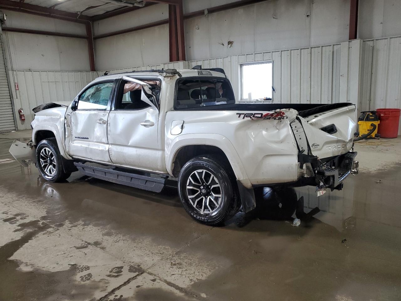 2022 Toyota Tacoma VIN 3TYCZ5AN0NT090009 Copart auction photo, all over damage thumbnail 2