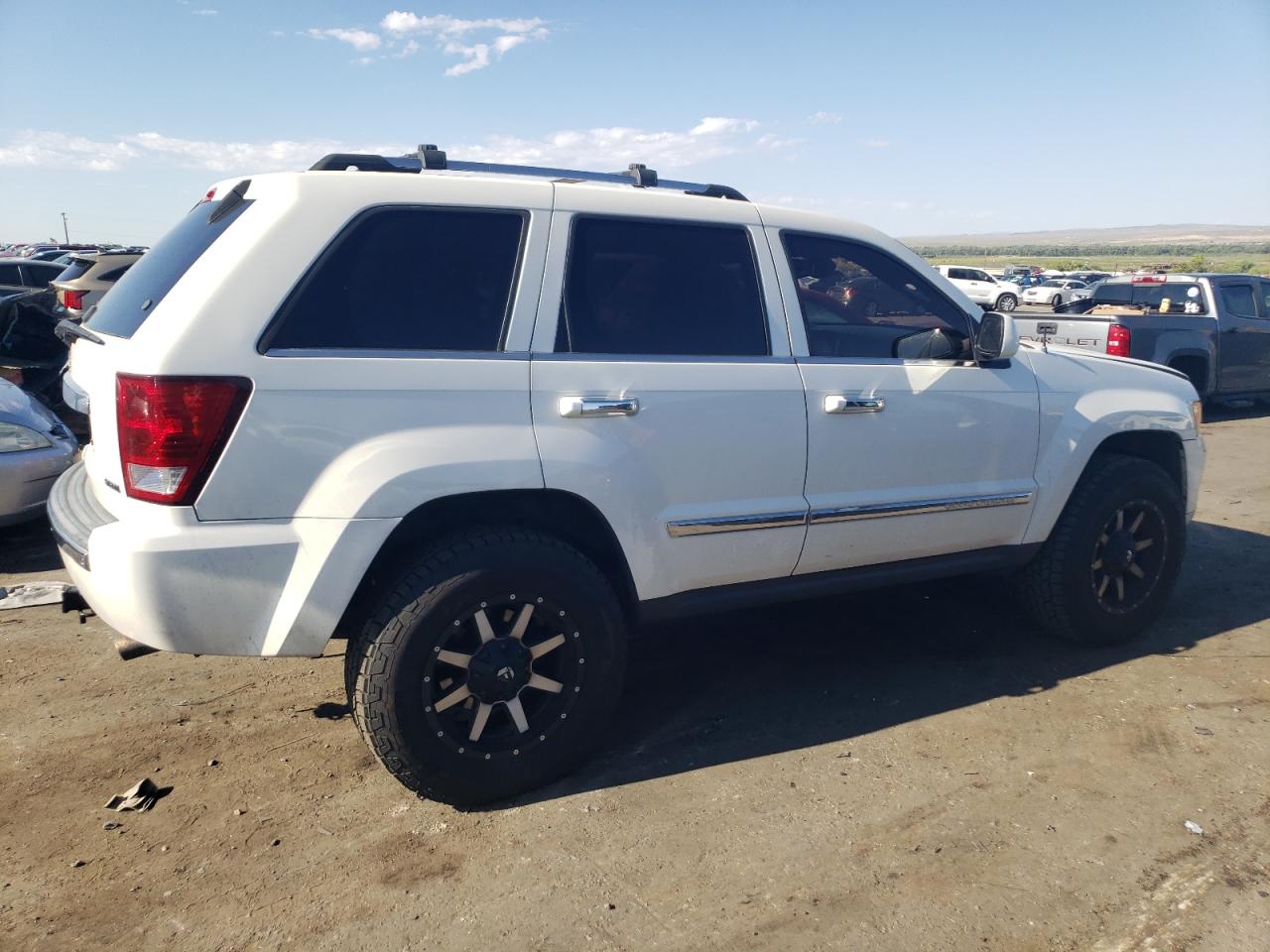 2010 Jeep Grand Cherokee VIN 1J4RR5GT1AC105697 Copart auction photo, side / minor dent/scratches damage thumbnail 3