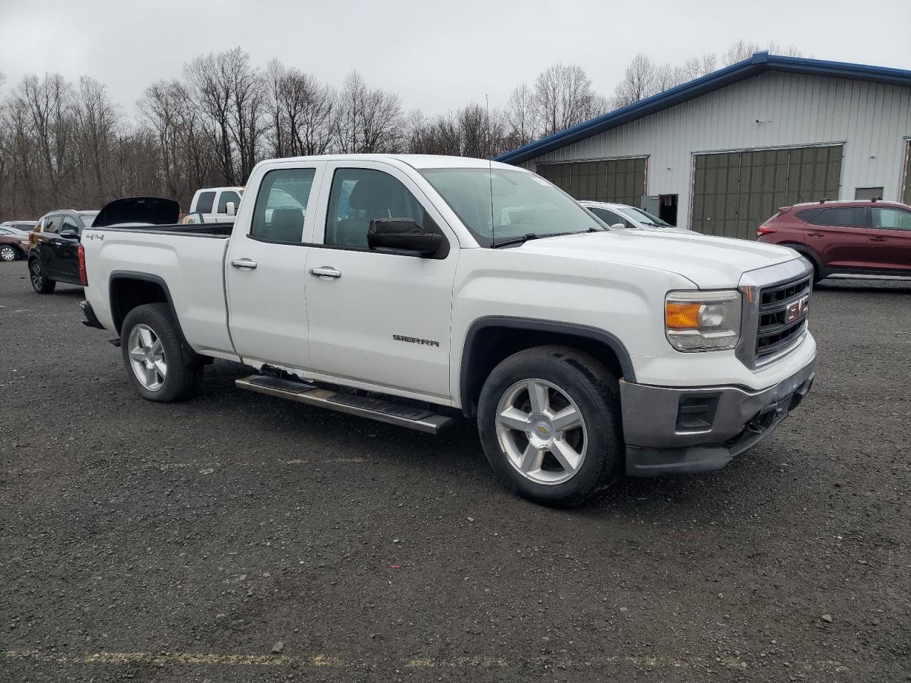 2015 GMC Sierra VIN 1GTV2TEC9FZ161889 Copart auction photo, front end / minor dent/scratches damage thumbnail 4