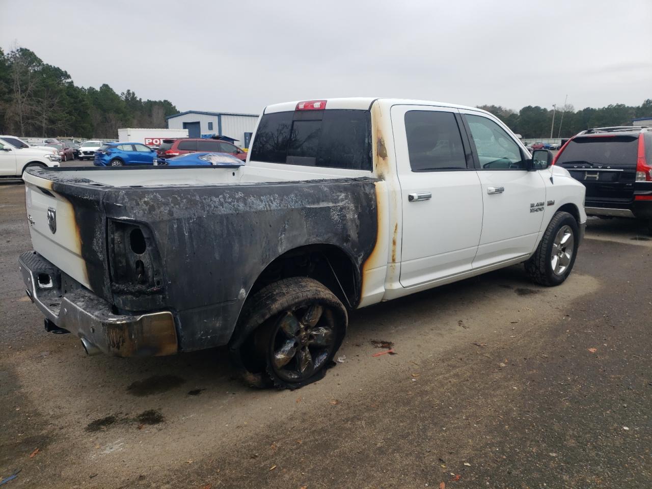 2016 RAM 1500 VIN 3C6RR6LT7GG300993 Copart auction photo, burn damage thumbnail 3
