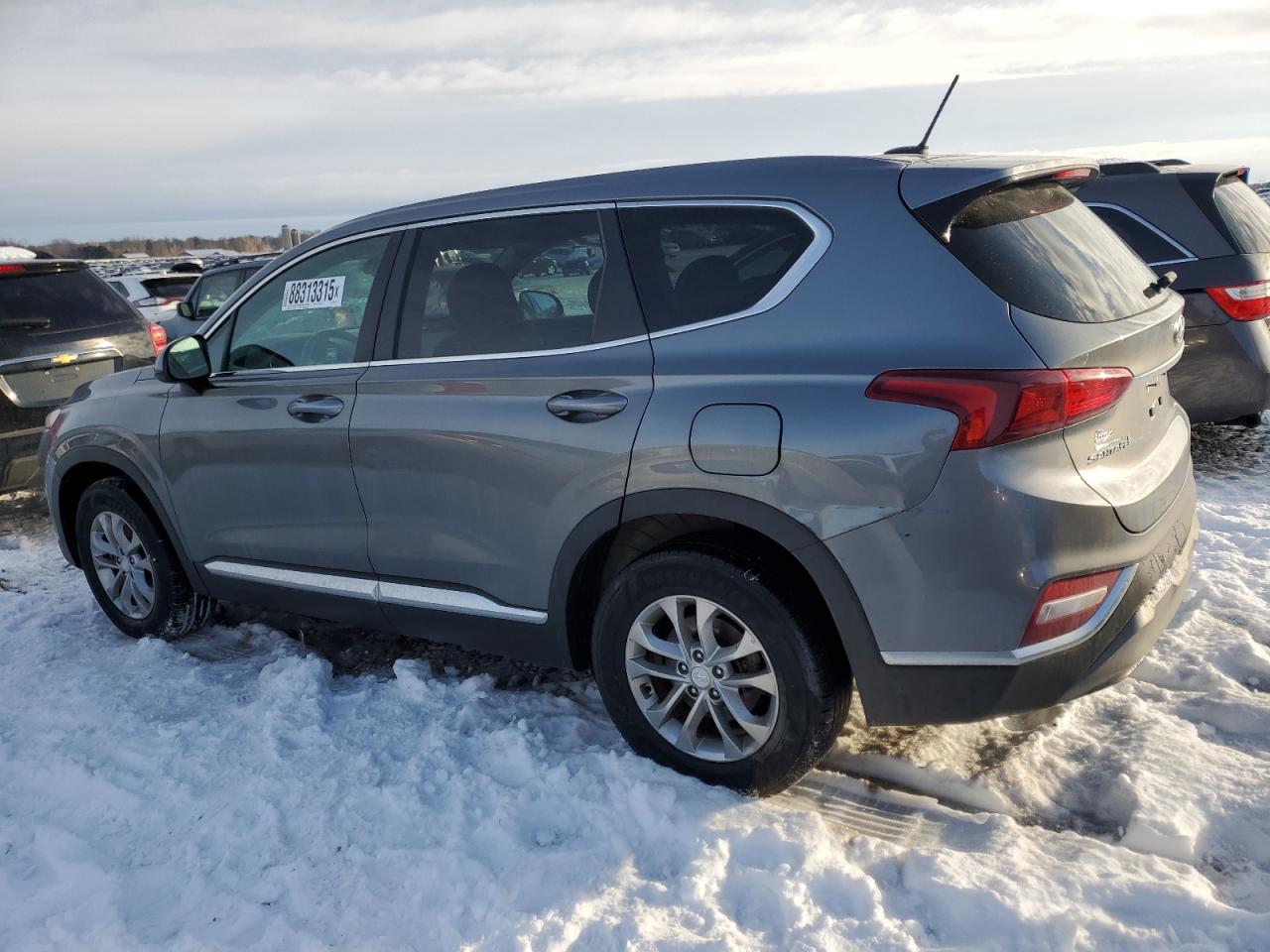 2019 Hyundai Santa Fe VIN 5NMS23AD9KH132702 Copart auction photo, front end / side damage thumbnail 2