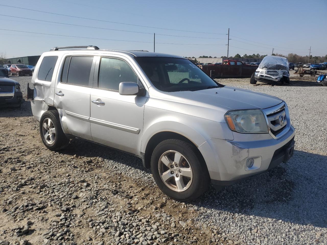 2011 Honda Pilot VIN 5FNYF3H44BB011579 Copart auction photo, side / rear end damage thumbnail 4