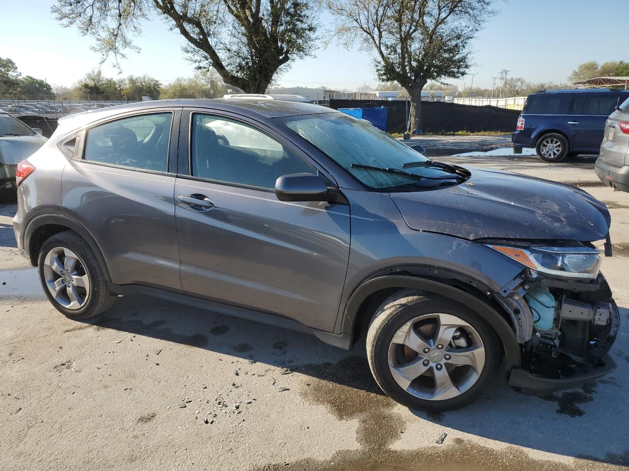 2019 Honda HR-V VIN 3CZRU5H37KM724821 Copart auction photo, front end / side damage thumbnail 4