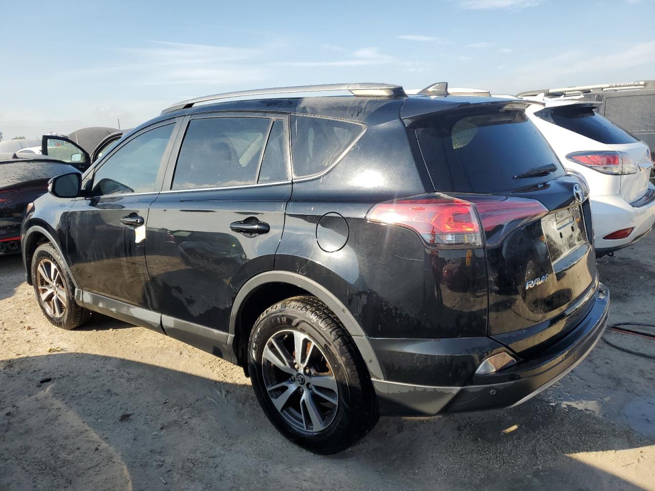 2018 Toyota RAV 4 VIN 2T3WFREV7JW455233 Copart auction photo, water/flood damage thumbnail 2