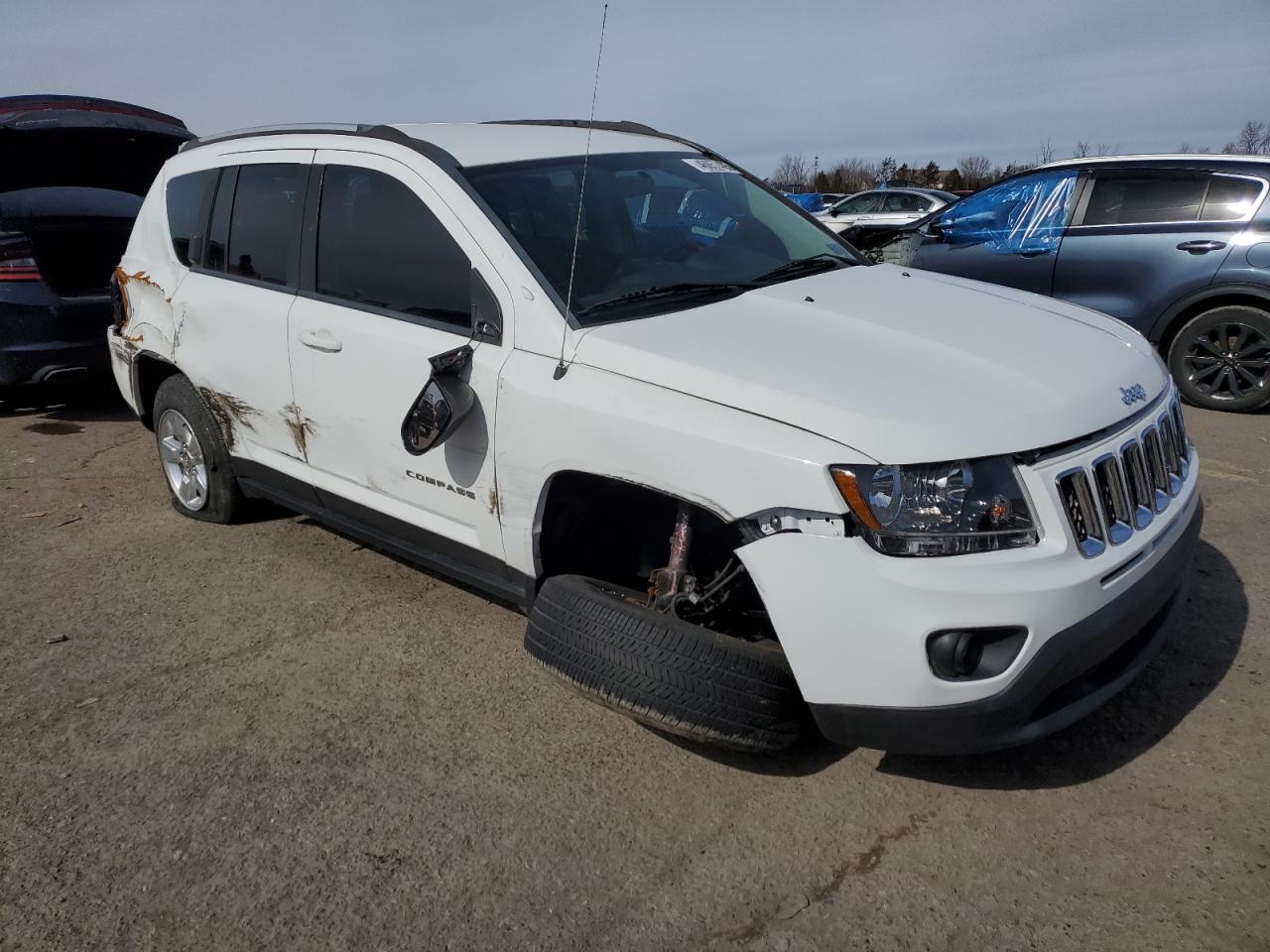 2015 Jeep Compass VIN 1C4NJCBA4FD334172 Copart auction photo, rear end / side damage thumbnail 4