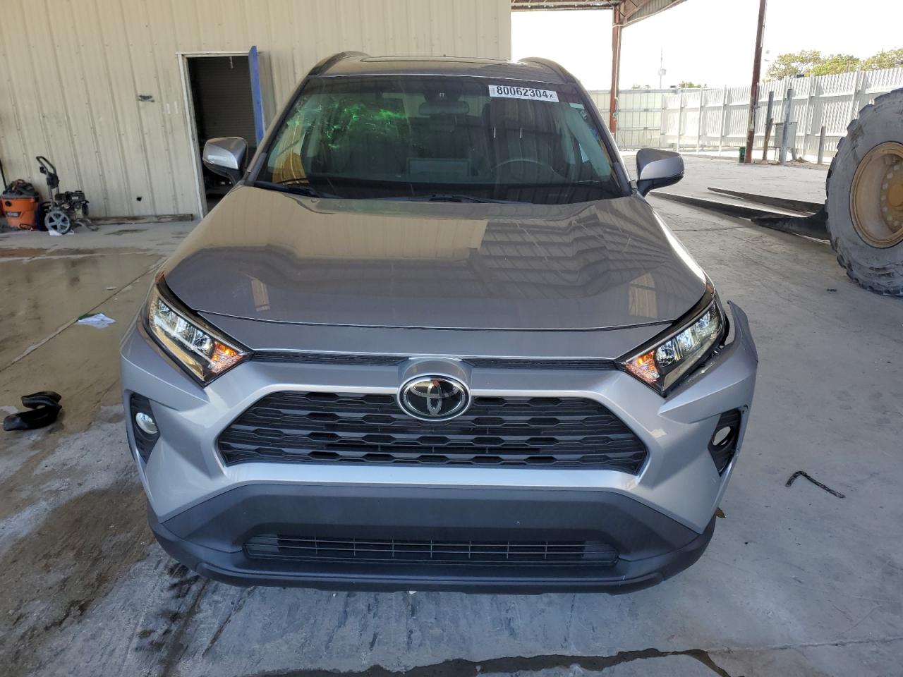 2021 Toyota RAV 4 VIN 2T3C1RFV2MC115915 Copart auction photo, front end / side damage thumbnail 5
