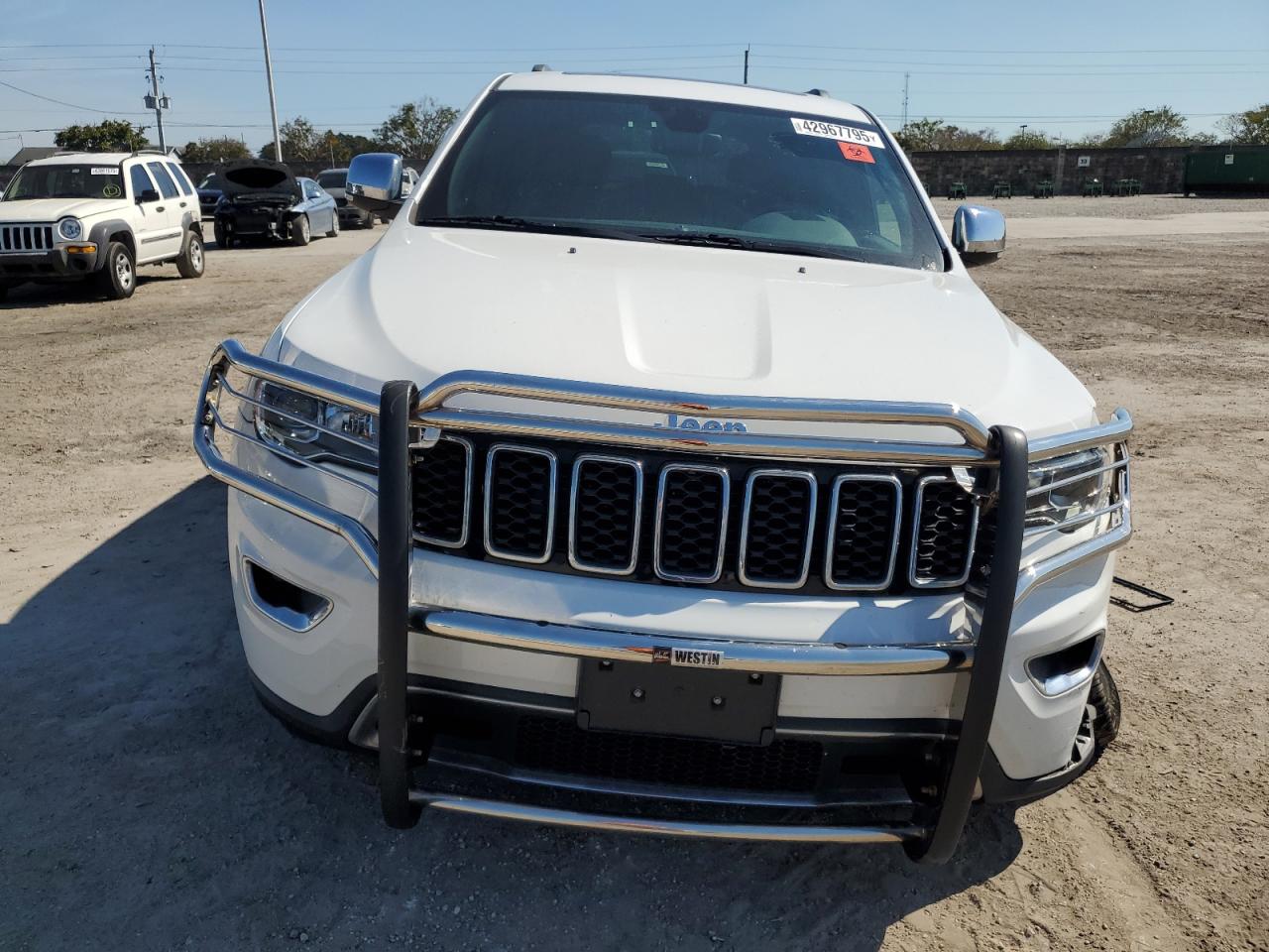 2018 Jeep Grand Cherokee VIN 1C4RJFBGXJC203723 Copart auction photo, front end / side damage thumbnail 5