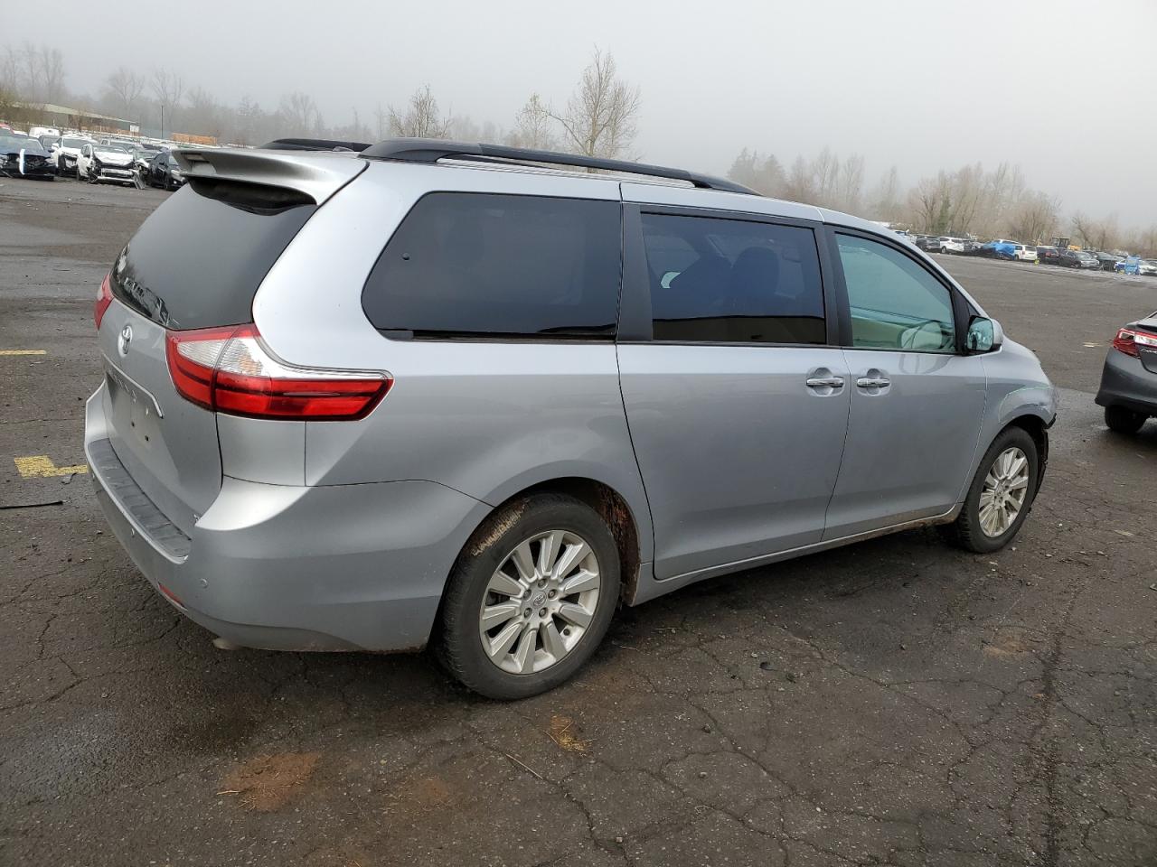 2015 Toyota Sienna VIN 5TDDK3DC1FS094400 Copart auction photo, front end damage thumbnail 3