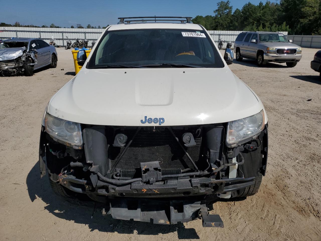 2012 Jeep Grand Cherokee VIN 1C4RJFCG8CC287705 Copart auction photo, front end damage thumbnail 5