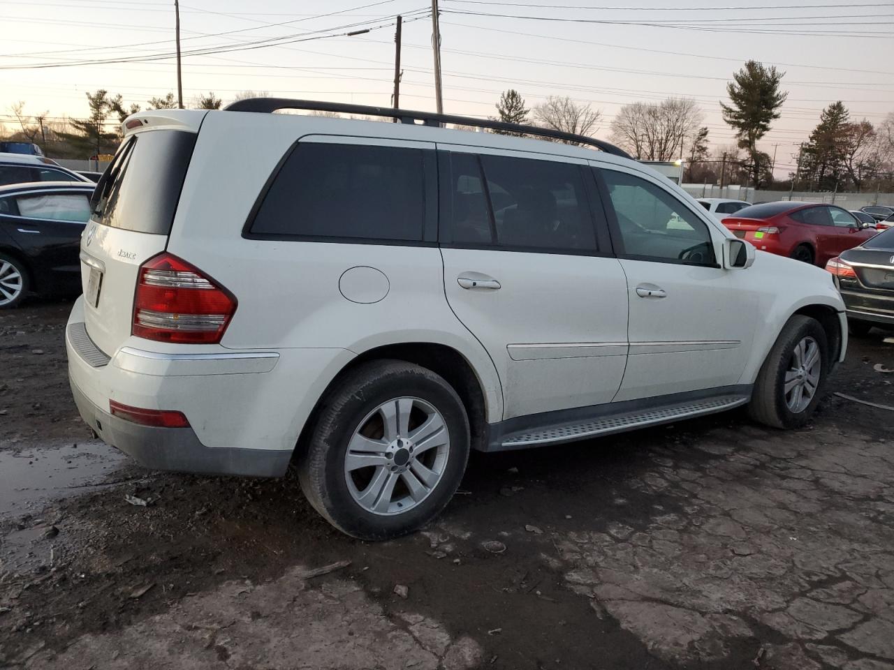 2009 Mercedes-Benz GL-klasse VIN 4JGBF71E39A453039 Copart auction photo, front end / rear end damage thumbnail 3