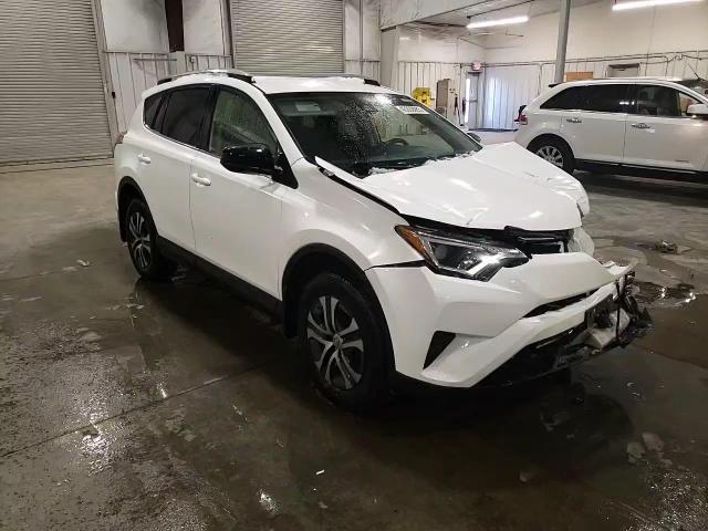 2018 Toyota RAV 4 VIN JTMZFREV9JJ729303 Copart auction photo, front end / side damage thumbnail 12