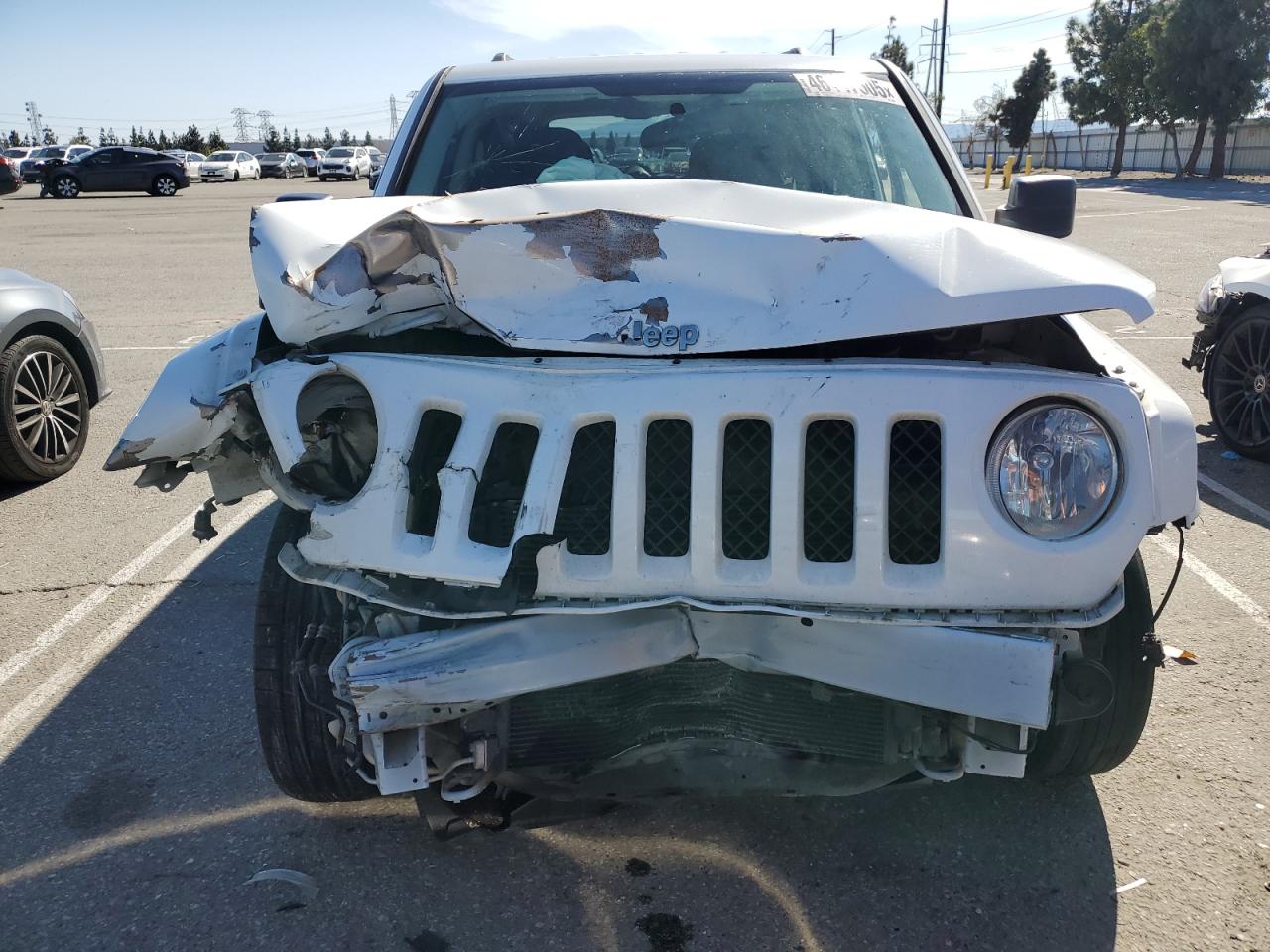 2015 Jeep Liberty (Patriot) VIN 1C4NJPBA9FD325409 Copart auction photo, front end damage thumbnail 5
