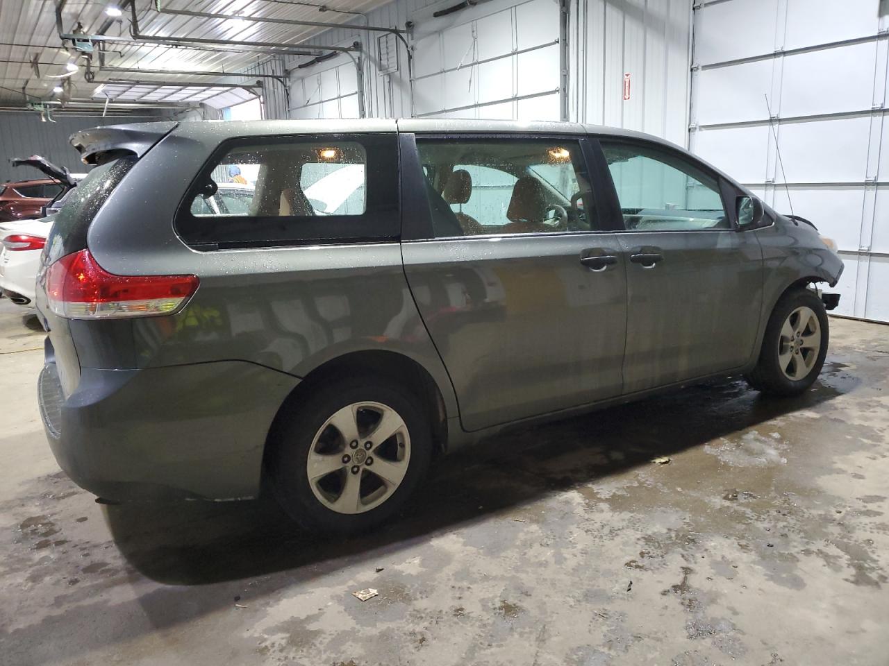 2012 Toyota Sienna VIN 5TDKA3DC0CS010900 Copart auction photo, side / front end damage thumbnail 3