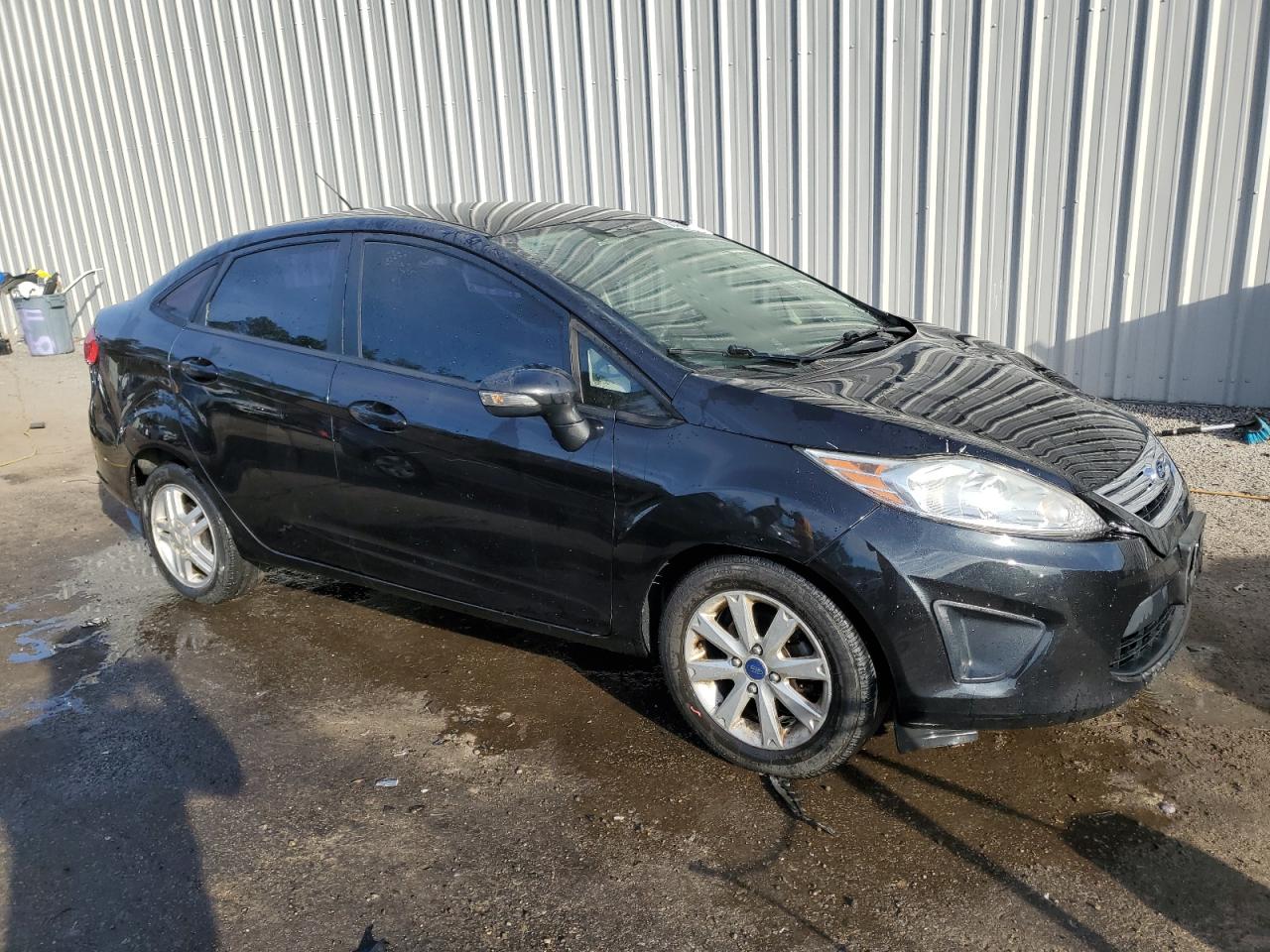 2013 Ford Fiesta VIN 3FADP4BJXDM226145 Copart auction photo, front end / side damage thumbnail 4
