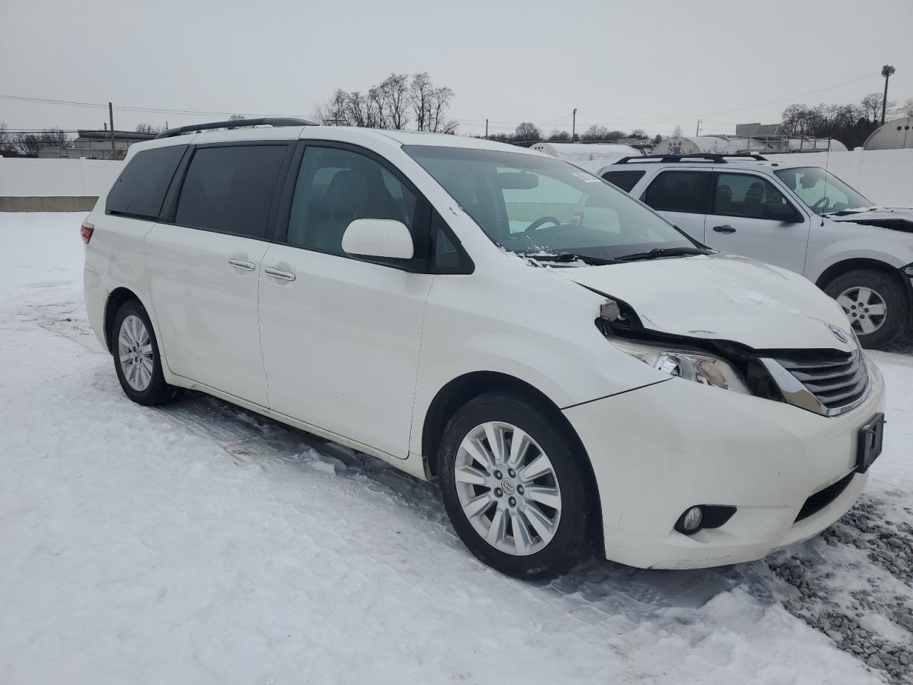 2015 Toyota Sienna VIN 5TDDK3DC4FS120259 Copart auction photo, front end / side damage thumbnail 4