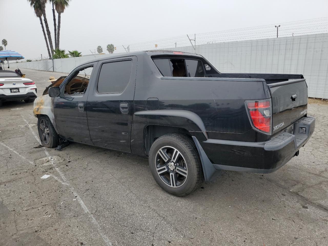 2013 Honda Ridgeline VIN 5FPYK1F74DB011900 Copart auction photo, burn damage thumbnail 2