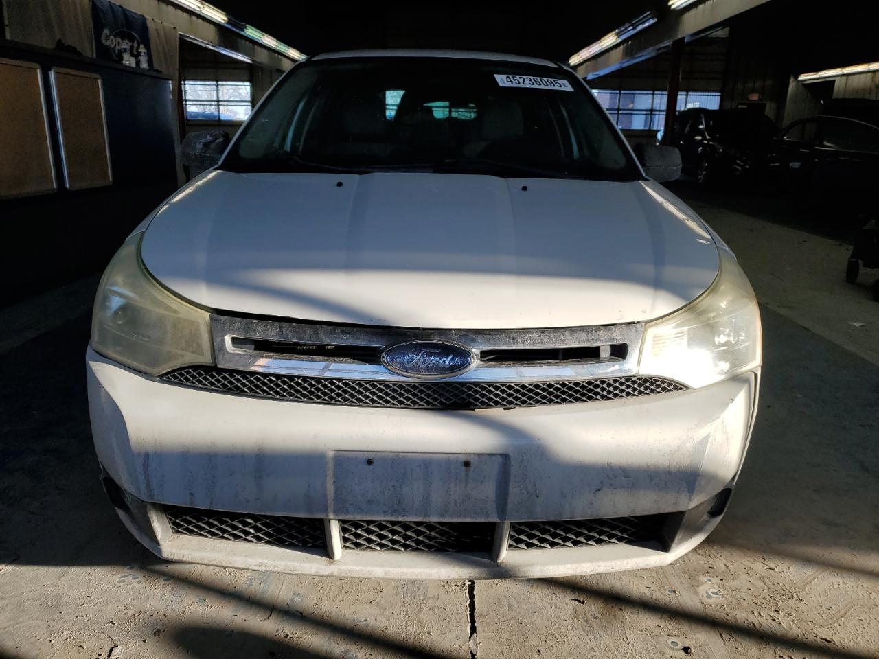2009 Ford Focus VIN 1FAHP35N19W138697 Copart auction photo, front end damage thumbnail 5