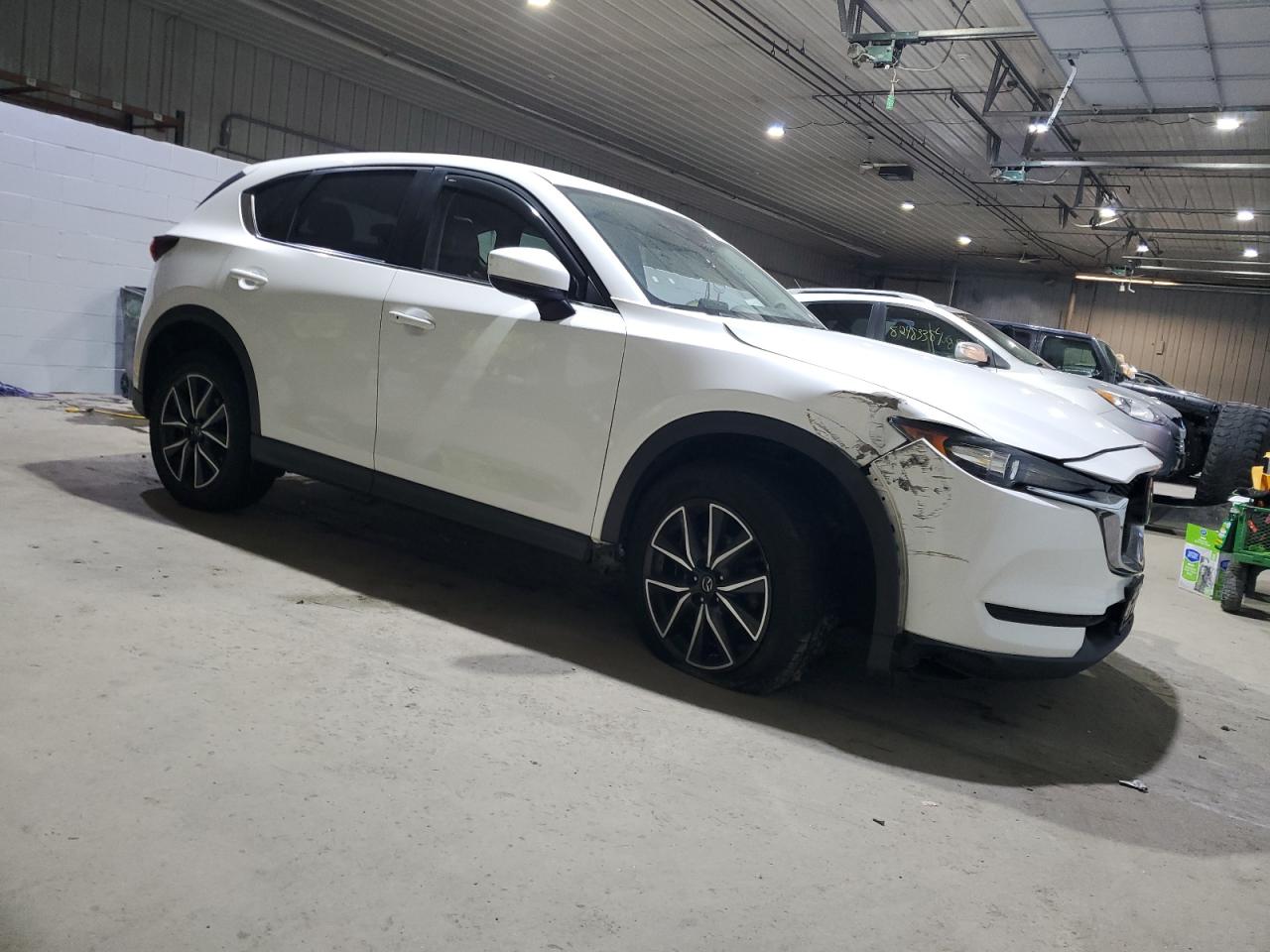 2018 Mazda CX-5 VIN JM3KFACM9J1323669 Copart auction photo, front end / minor dent/scratches damage thumbnail 4