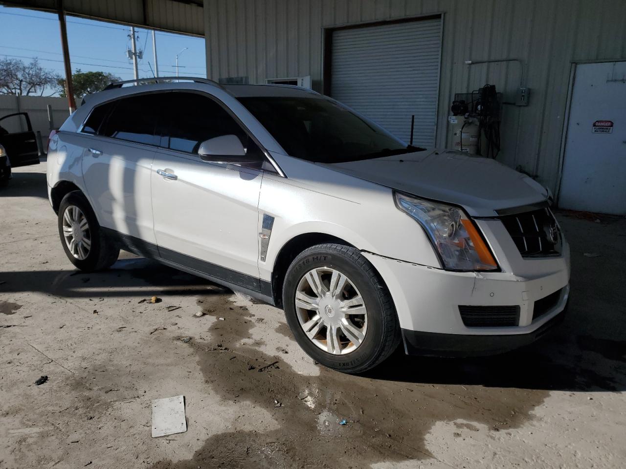 2012 Cadillac SRX VIN 3GYFNAE37CS631338 Copart auction photo, front end / mechanical damage thumbnail 4
