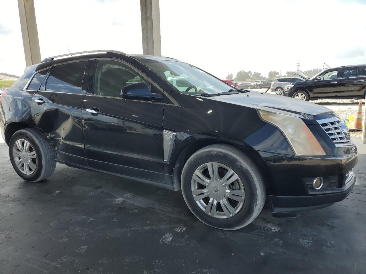 2013 Cadillac SRX VIN 3GYFNCE32DS622253 Copart auction photo, side / rear end damage thumbnail 4
