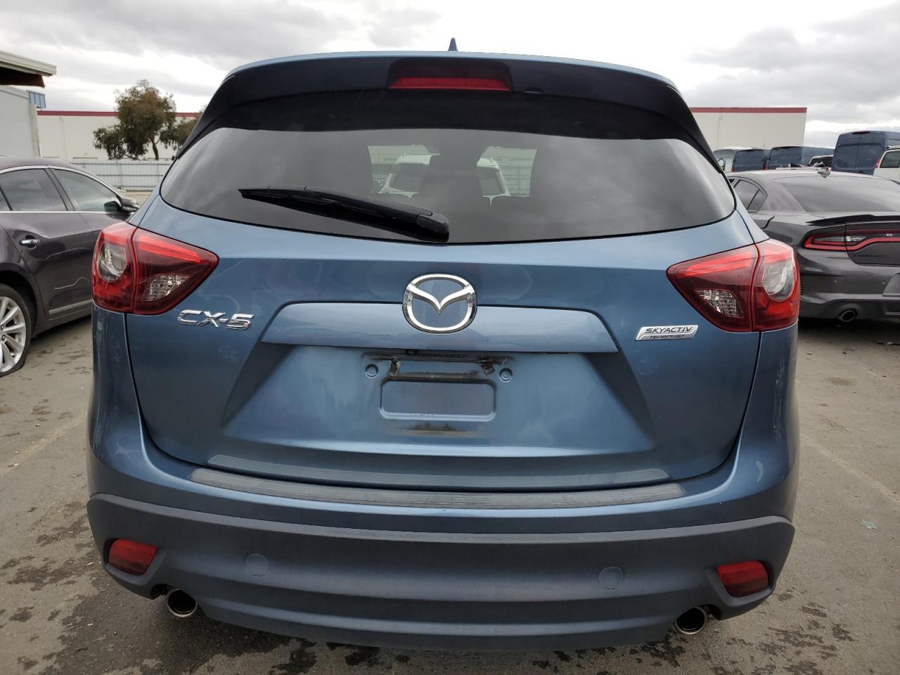 2016 Mazda CX-5 VIN JM3KE2DY1G0733794 Copart auction photo, side damage thumbnail 6