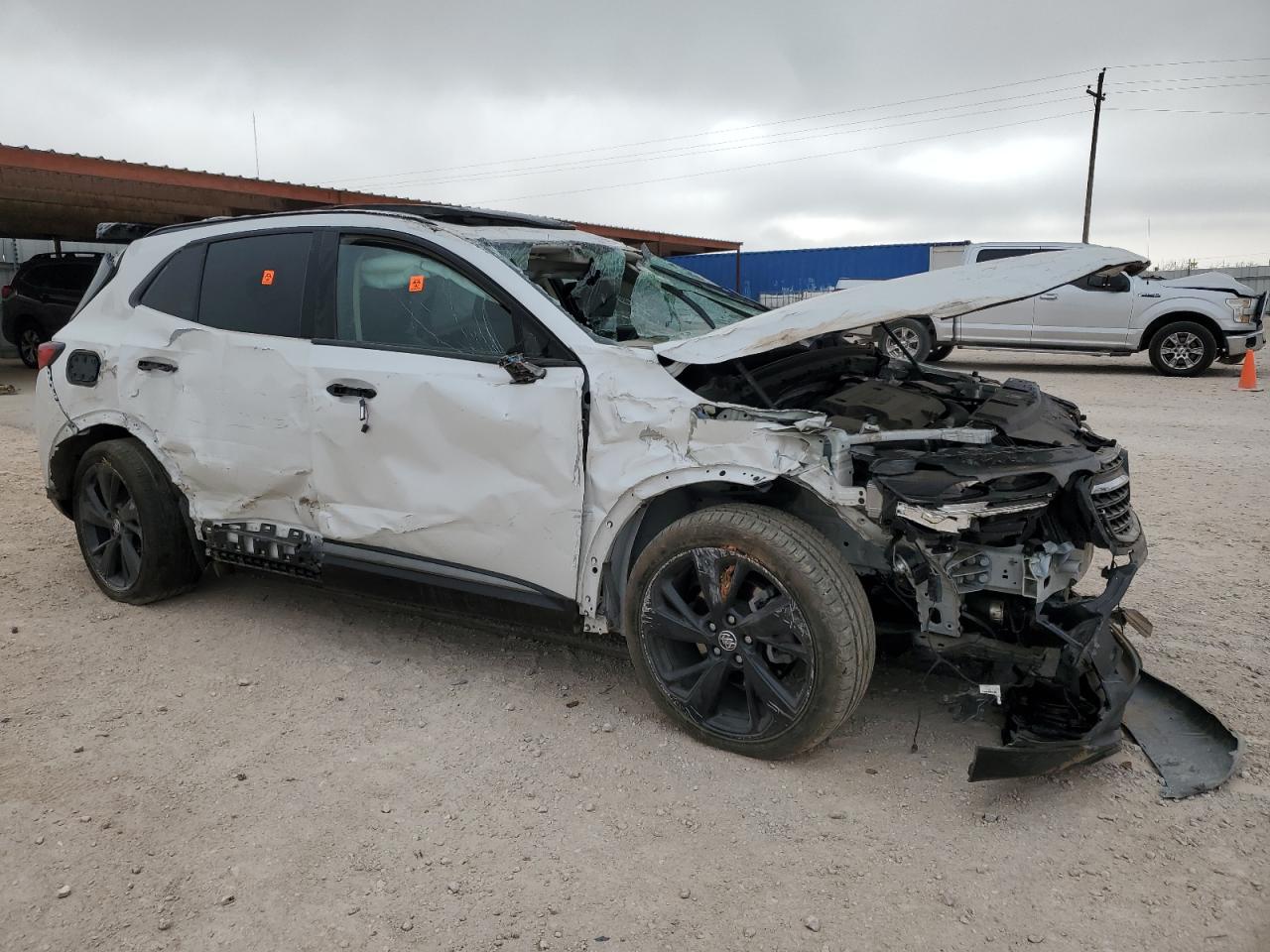 2023 Buick Envision VIN LRBFZNR47PD067022 Copart auction photo, rollover damage thumbnail 4