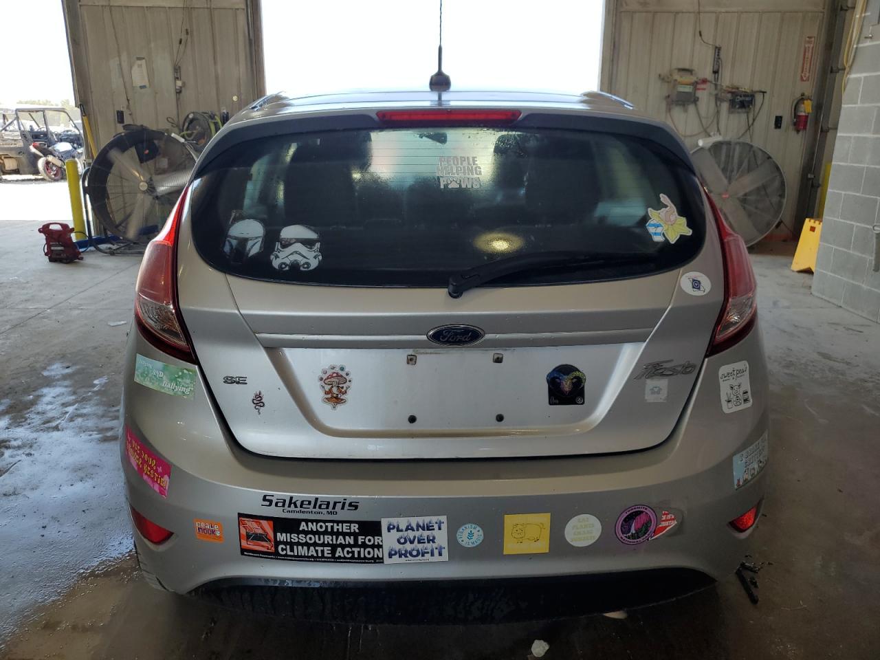 2017 Ford Fiesta VIN 3FADP4EJ0HM150484 Copart auction photo, side / hail damage thumbnail 6