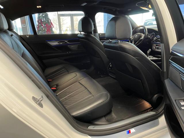 2018 BMW 7er VIN WBA7E2C50JG743251 Copart auction photo, minor dent/scratches / normal wear damage thumbnail 6