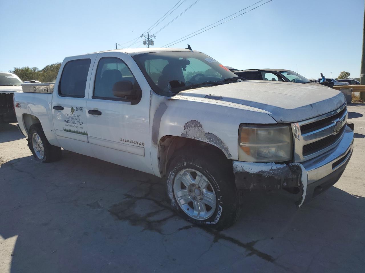 2011 Chevrolet Silverado VIN 3GCPKSE31BG273471 Copart auction photo, burn damage thumbnail 4
