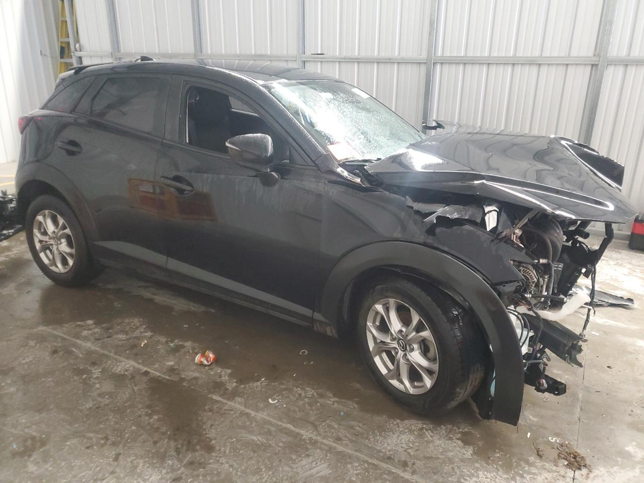 2021 Mazda CX-3 VIN JM1DKDB79M1502972 Copart auction photo, front end / minor dent/scratches damage thumbnail 4