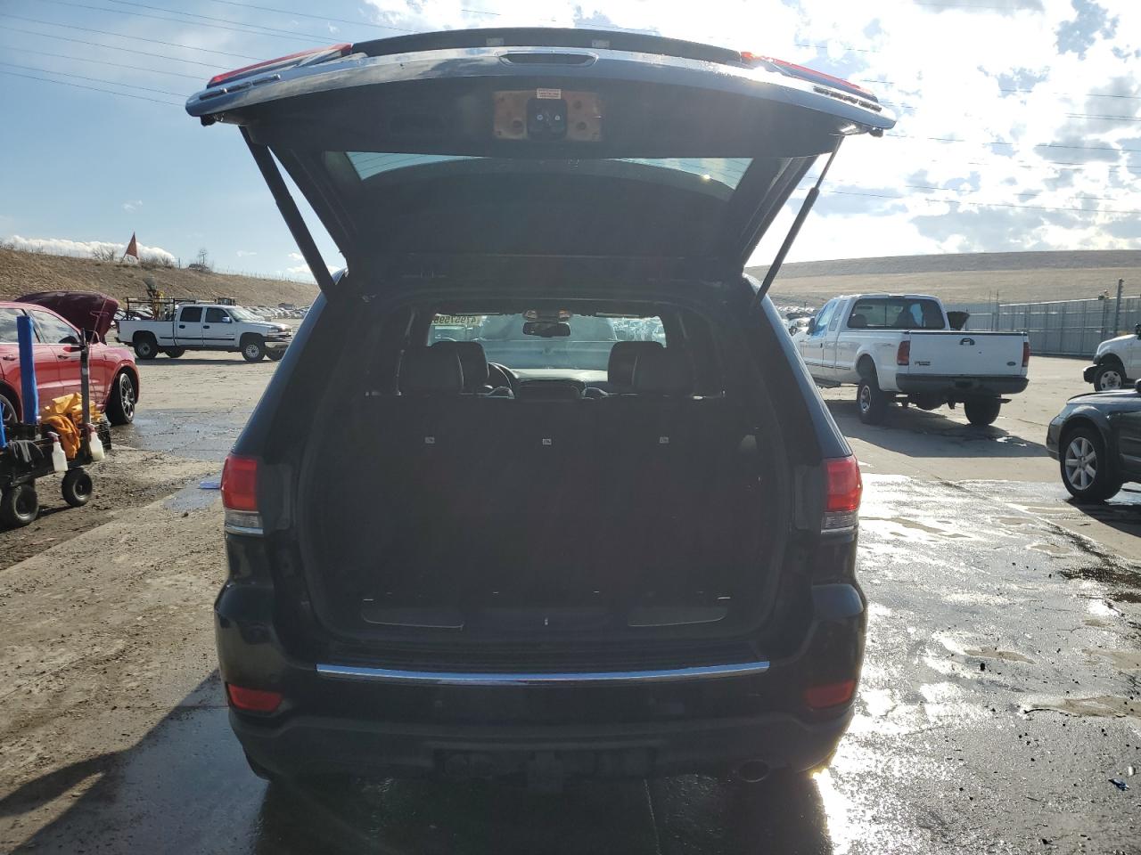 2015 Jeep Grand Cherokee VIN 1C4RJFBG3FC149656 Copart auction photo, front end / side damage thumbnail 6