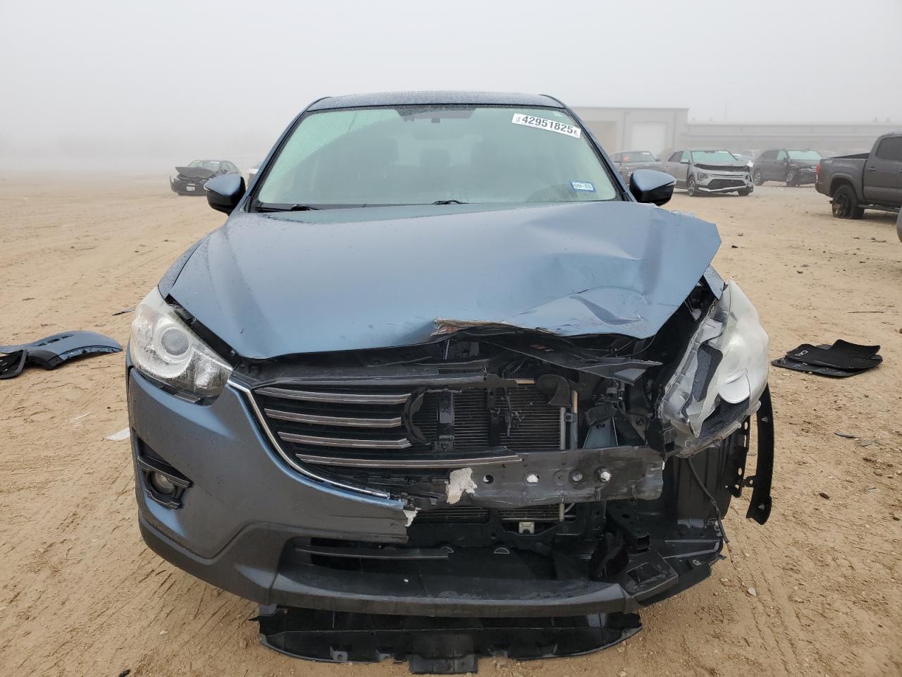 2016 Mazda CX-5 VIN JM3KE4DY3G0854970 Copart auction photo, front end damage thumbnail 5