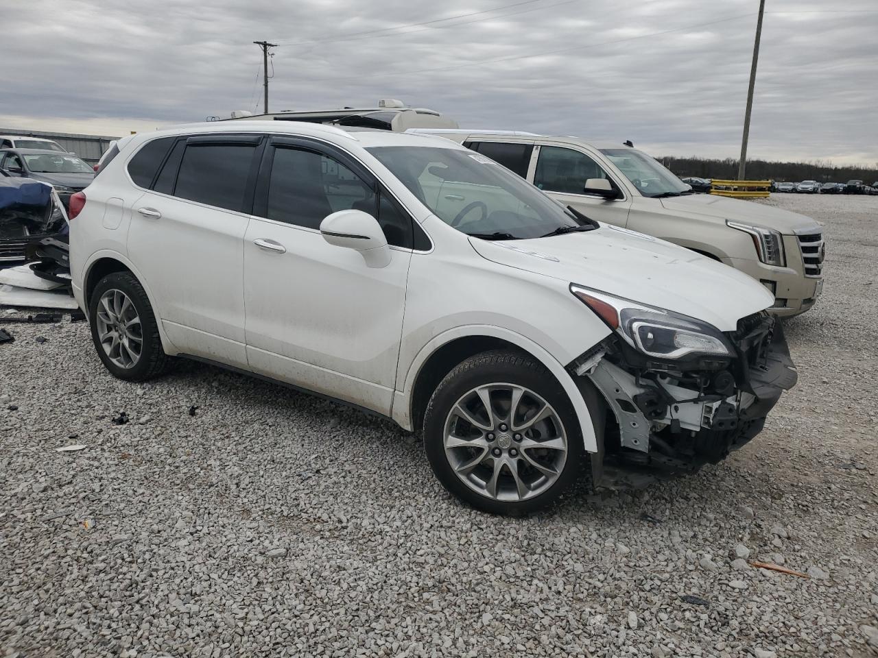 2020 Buick Envision VIN LRBFX2SA0LD199795 Copart auction photo, front end / side damage thumbnail 4