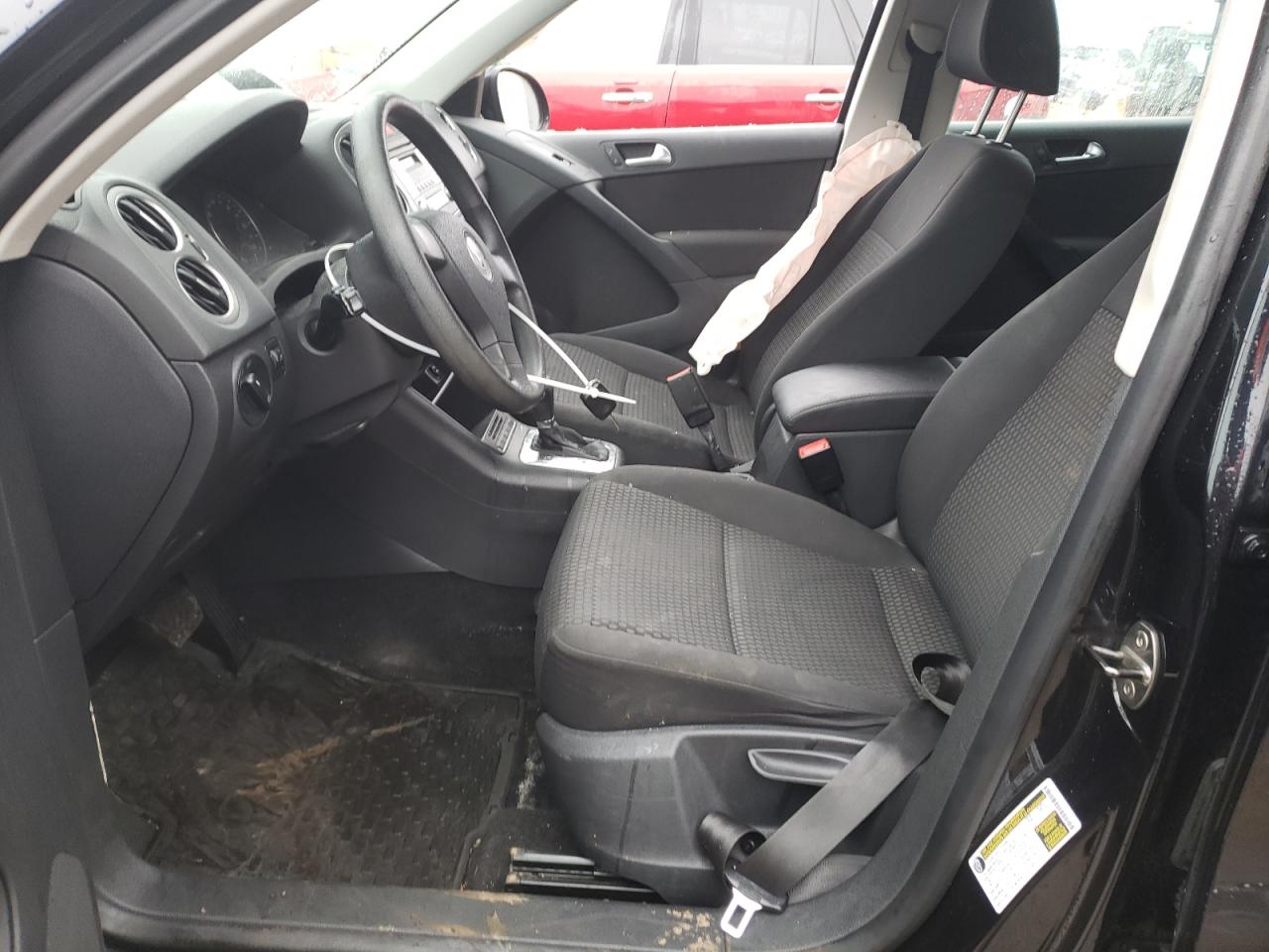 2010 Volkswagen Tiguan VIN WVGBV7AX1AW521804 Copart auction photo, side damage thumbnail 7