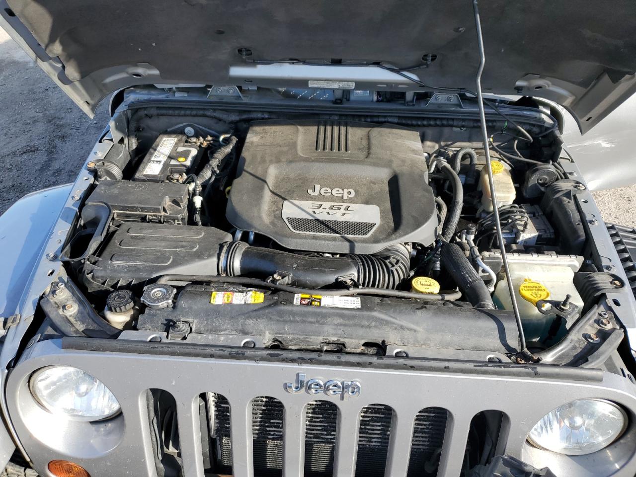 2013 Jeep Wrangler VIN 1C4HJWEG6DL597507 Copart auction photo, front end / side damage thumbnail 12