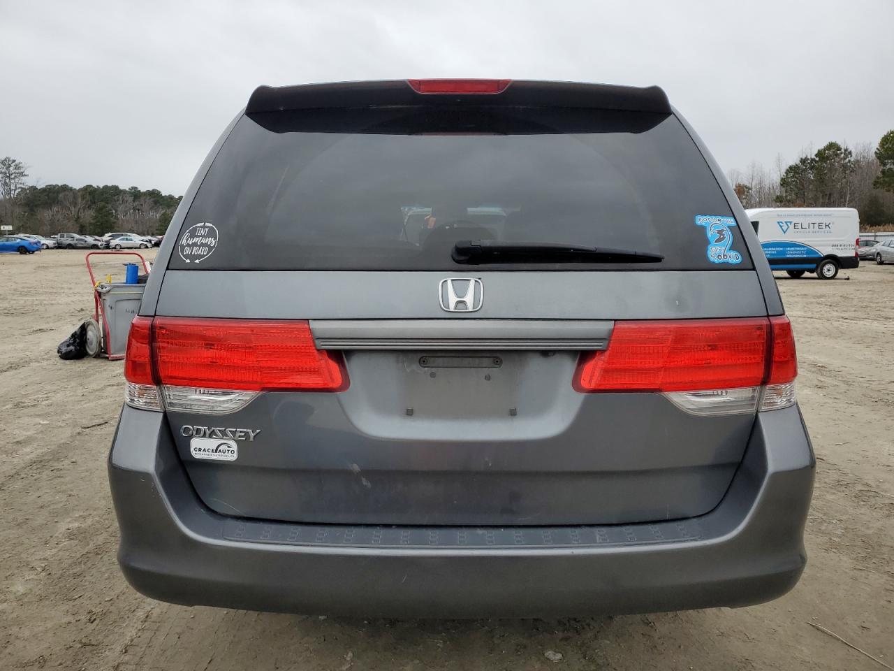 2010 Honda Odyssey VIN 5FNRL3H6XAB052876 Copart auction photo, front end / minor dent/scratches damage thumbnail 6
