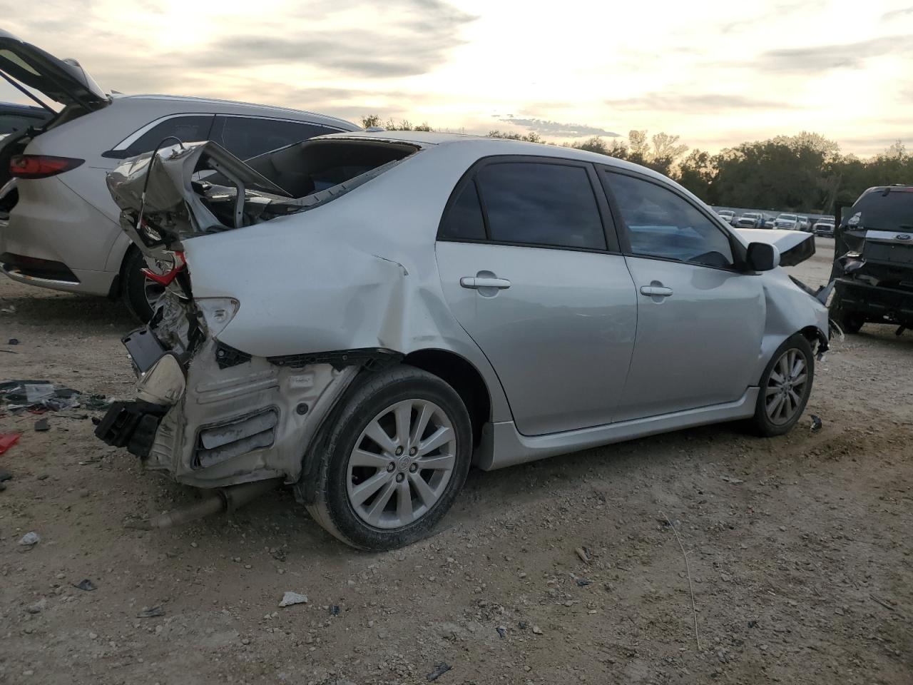 2010 Toyota Corolla VIN 1NXBU4EE9AZ195577 Copart auction photo, all over damage thumbnail 3