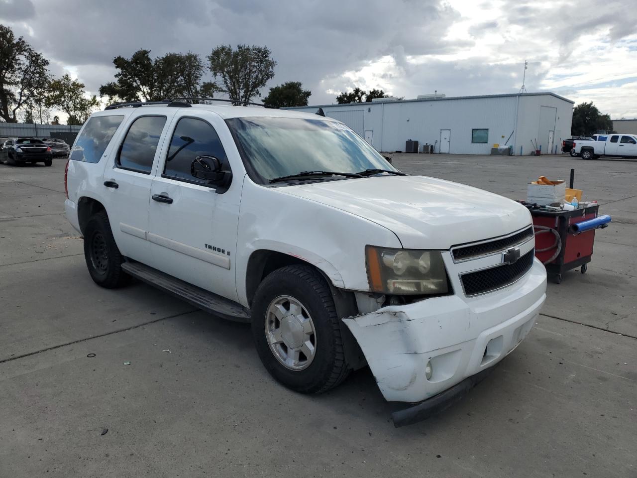 2007 Chevrolet Tahoe VIN 1GNFC13JX7J141102 Copart auction photo, front end / side damage thumbnail 4